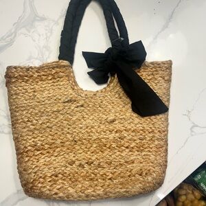 Cute straw/wicker bag with black bow and handle